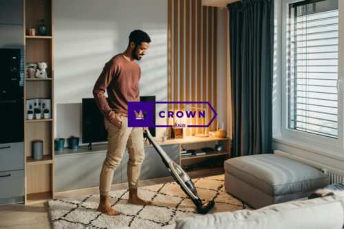 a man cleaning the room